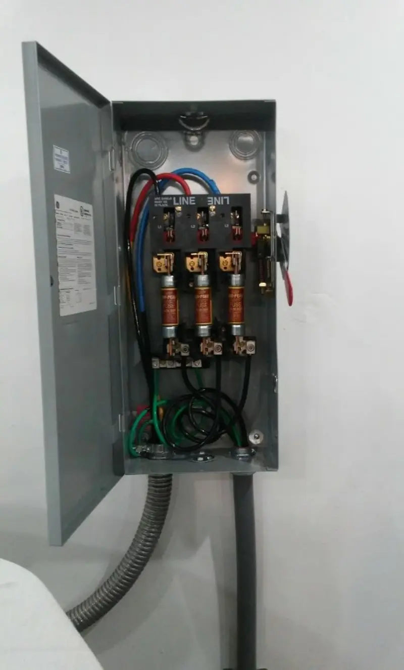 Three-phase disconnect switch installed for Smoke Detector Installation in Fall River